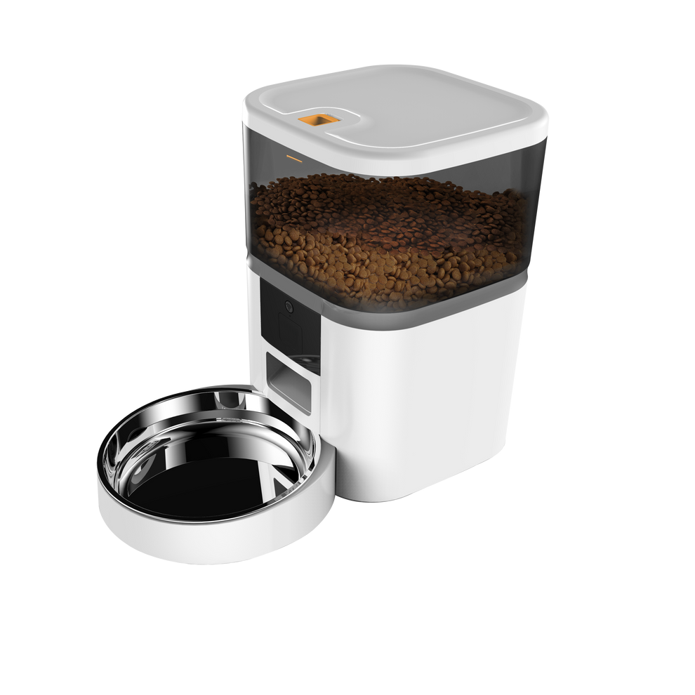 White tech food dispenser with a metalic food plate.